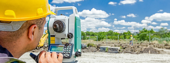 Professional Insurance Brokers - Inland Marine Liability - image of man land surveying